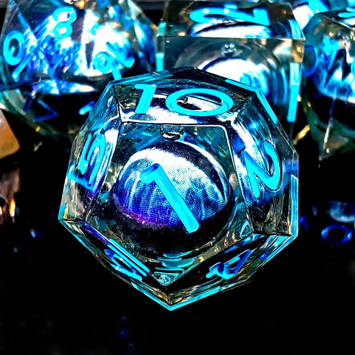 DnD Dice Set - Resin Dice with Spinning Dragon Eye Core, Transparent Blue Text, Perfect for Tabletop RPG & Board Games