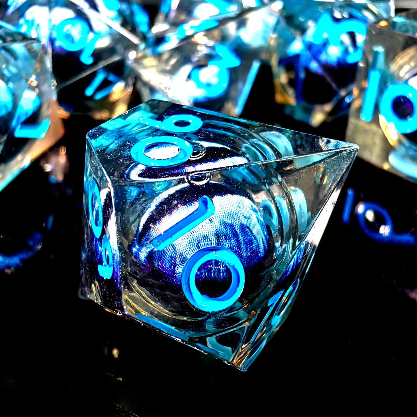 DnD Dice Set - Resin Dice with Spinning Dragon Eye Core, Transparent Blue Text, Perfect for Tabletop RPG & Board Games