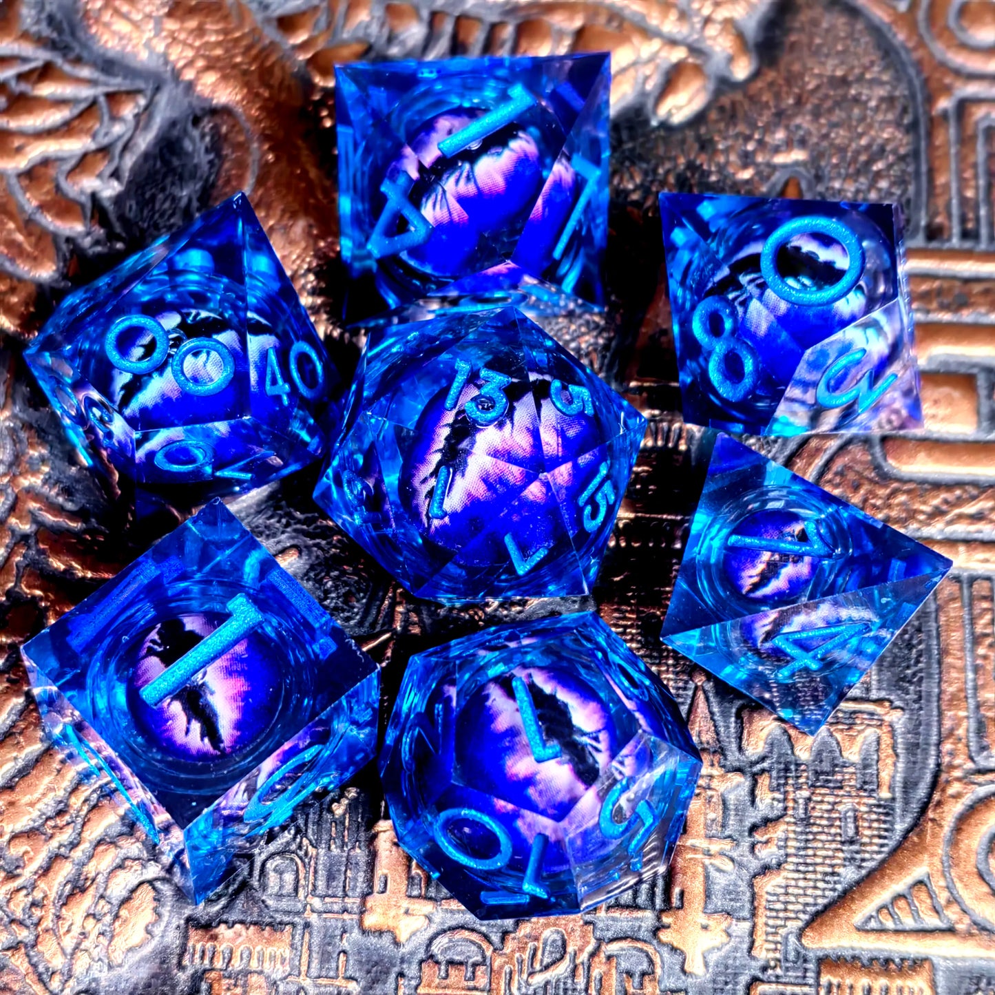 DnD Dice Set - Resin Dice with Spinning Dragon Eye Core, Transparent Blue Text, Perfect for Tabletop RPG & Board Games